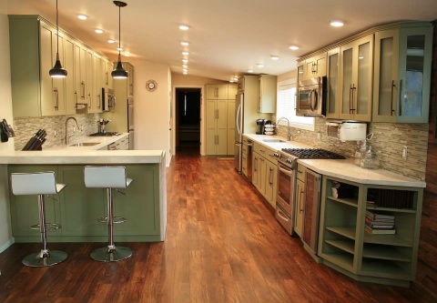 Custom Kitchen with green cabinets